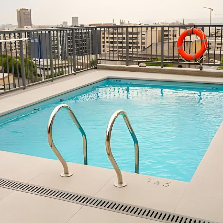 Modern Apartment with Terrace | Steps from Movistar Arena & Barrio Universitario | Up to 4 Guests - One-Bedroom Apartment with Balcony - 34