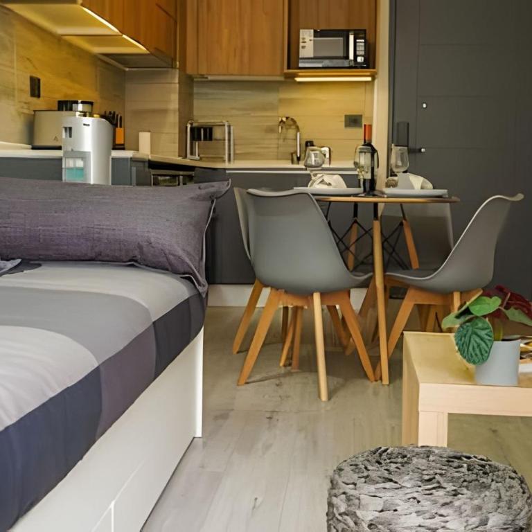 Modern Apartment with Terrace | Steps from Movistar Arena & Barrio Universitario | Up to 4 Guests - One-Bedroom Apartment with Balcony - 20