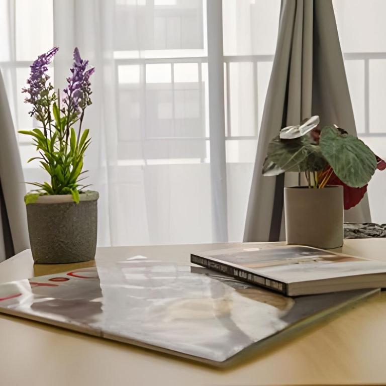 Modern Apartment with Terrace | Steps from Movistar Arena & Barrio Universitario | Up to 4 Guests - One-Bedroom Apartment with Balcony - 23