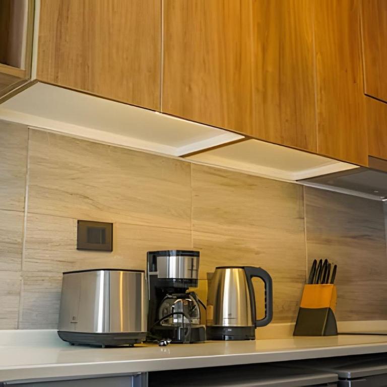 Modern Apartment with Terrace | Steps from Movistar Arena & Barrio Universitario | Up to 4 Guests - One-Bedroom Apartment with Balcony - 25