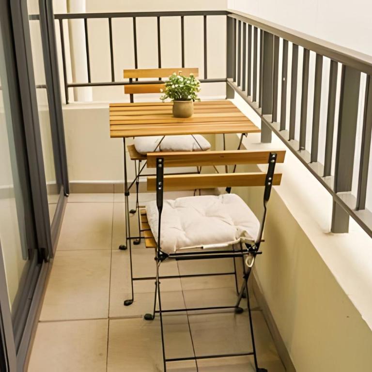 Modern Apartment with Terrace | Steps from Movistar Arena & Barrio Universitario | Up to 4 Guests - One-Bedroom Apartment with Balcony - 30