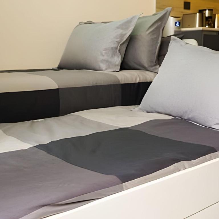 Modern Apartment with Terrace | Steps from Movistar Arena & Barrio Universitario | Up to 4 Guests - One-Bedroom Apartment with Balcony - 15