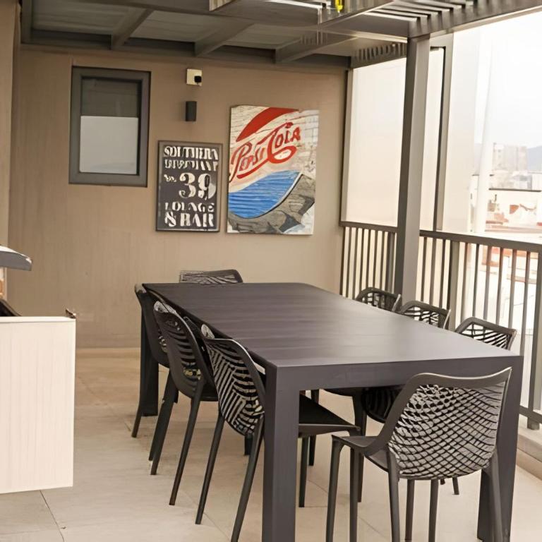 Modern Apartment with Terrace | Steps from Movistar Arena & Barrio Universitario | Up to 4 Guests - One-Bedroom Apartment with Balcony - 40