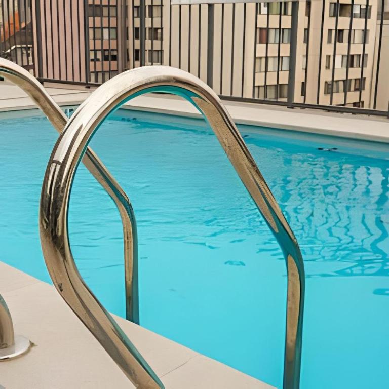 Modern Apartment with Terrace | Steps from Movistar Arena & Barrio Universitario | Up to 4 Guests - One-Bedroom Apartment with Balcony - 36