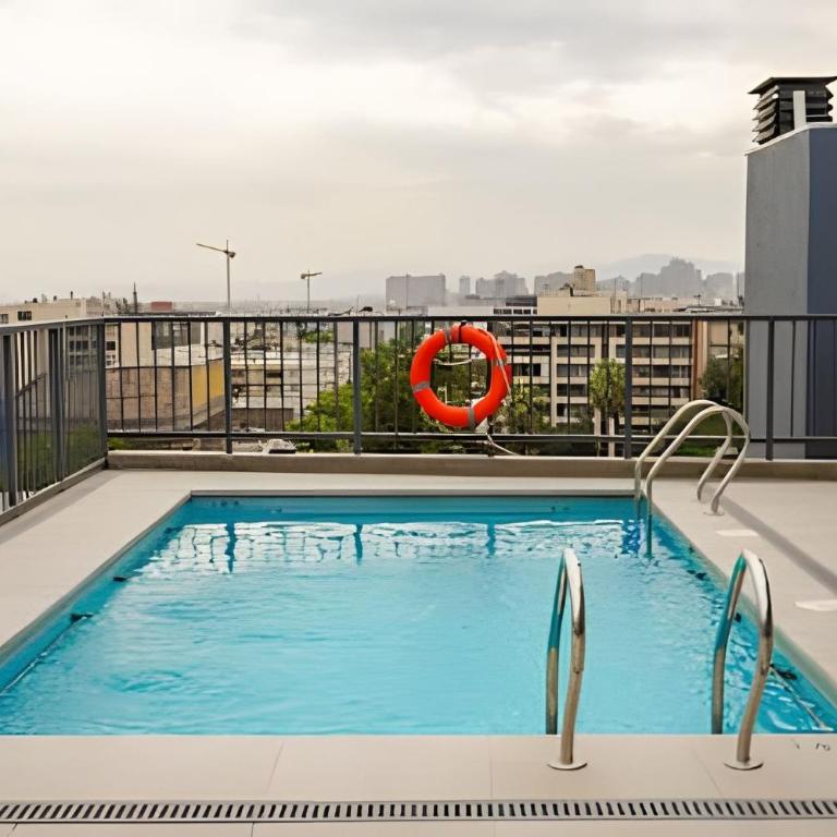 Modern Apartment with Terrace | Steps from Movistar Arena & Barrio Universitario | Up to 4 Guests - One-Bedroom Apartment with Balcony - 33