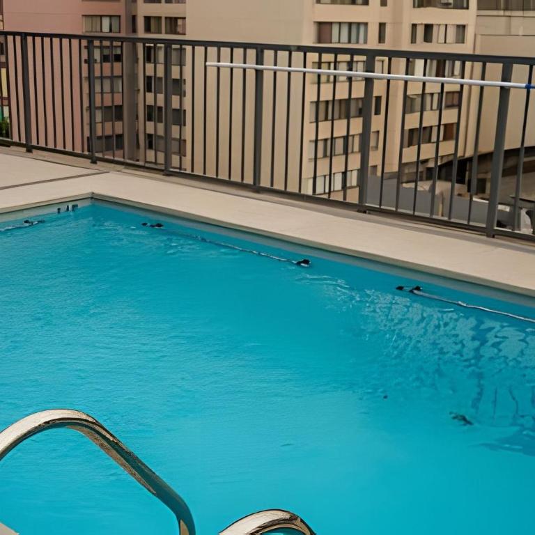 Modern Apartment with Terrace | Steps from Movistar Arena & Barrio Universitario | Up to 4 Guests - One-Bedroom Apartment with Balcony - 37