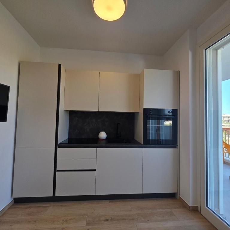 M4REE Seaside Suites & Relax - Suite con 1 Camera da Letto - 4