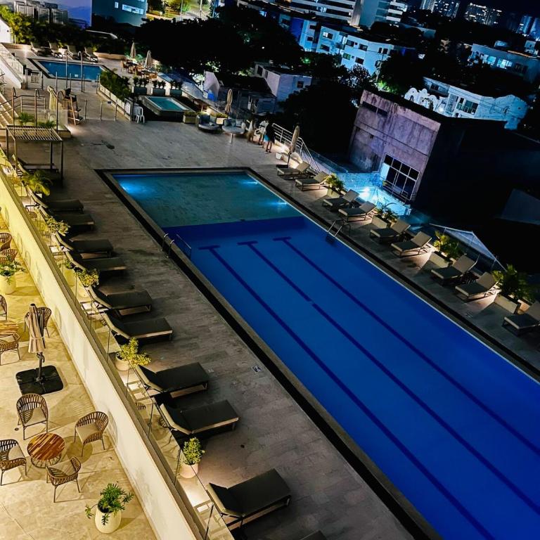 Lovely Suite steps away from the airport and sea - One-Bedroom Apartment with Pool View - 20