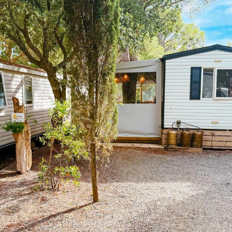 Chalets with kitchen outside at Camping Leï Suves - JoyCasa - Chalet - 4