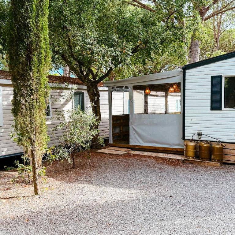 Chalets with kitchen outside at Camping Leï Suves - JoyCasa - Chalet - 7