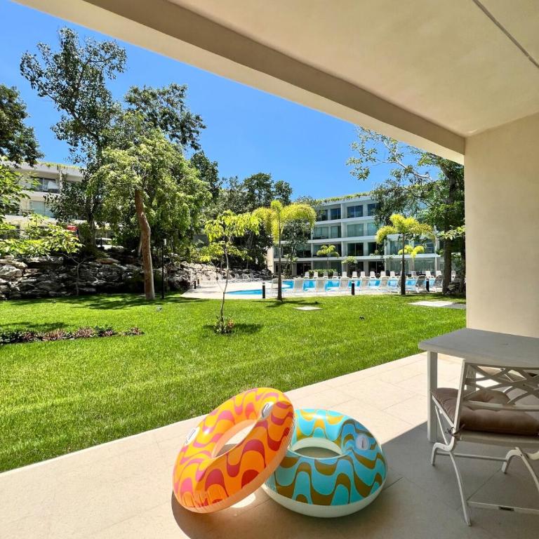Luxurious Condo with Poolside Patio - Two-Bedroom Apartment with Pool View - 1