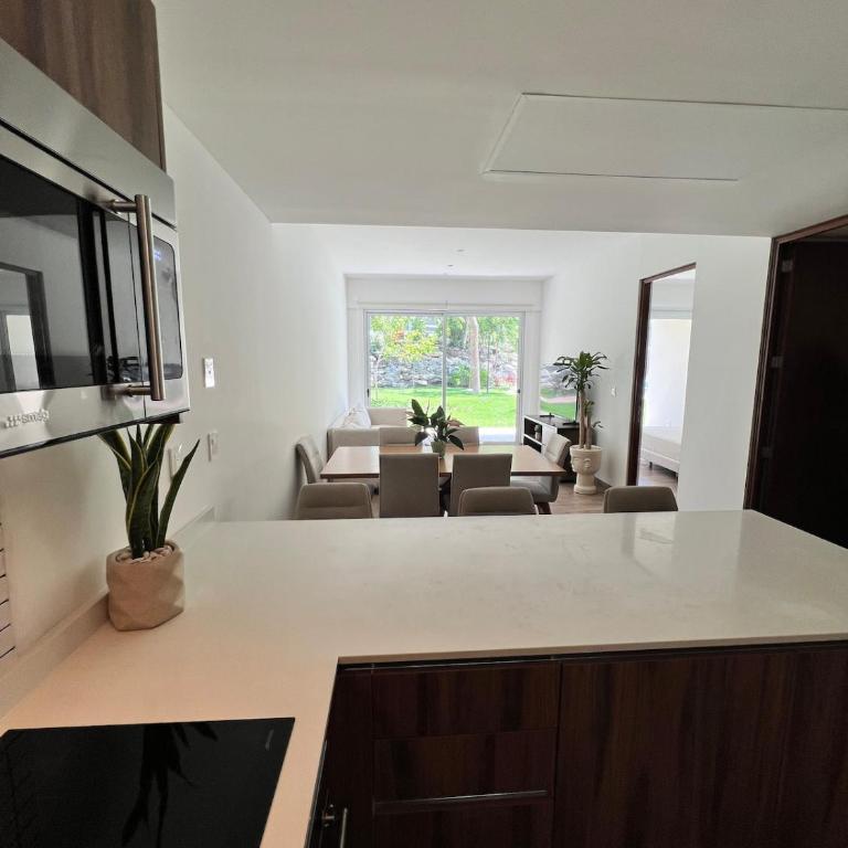 Luxurious Condo with Poolside Patio - Two-Bedroom Apartment with Pool View - 2