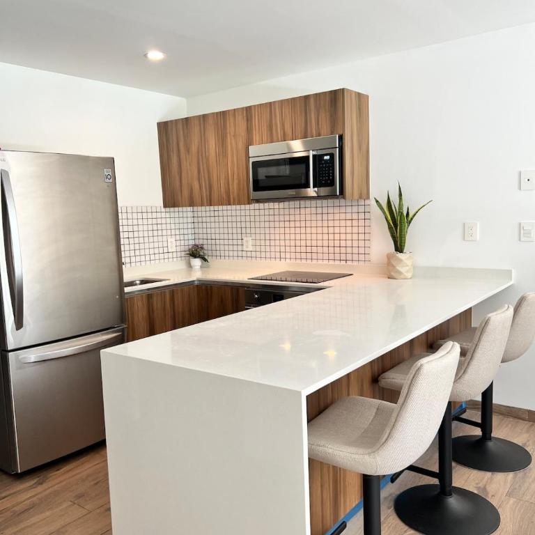 Luxurious Condo with Poolside Patio - Two-Bedroom Apartment with Pool View - 3