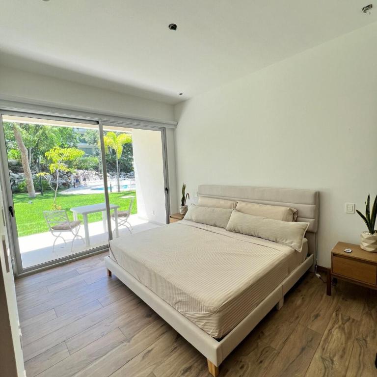 Luxurious Condo with Poolside Patio - Two-Bedroom Apartment with Pool View - 11