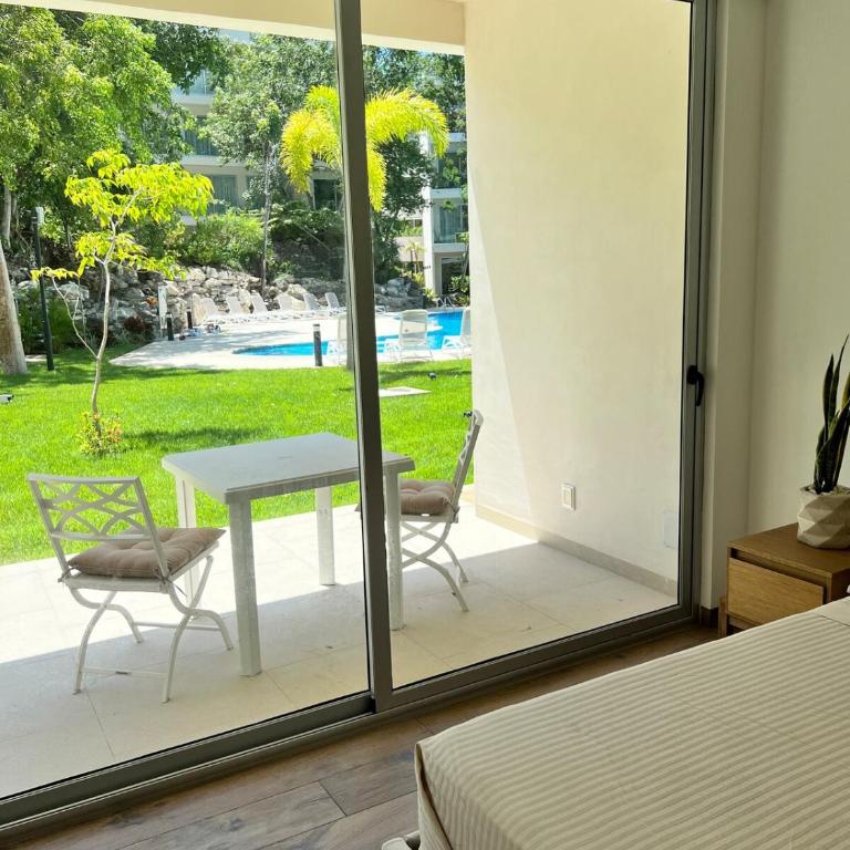 Luxurious Condo with Poolside Patio - Two-Bedroom Apartment with Pool View - 12