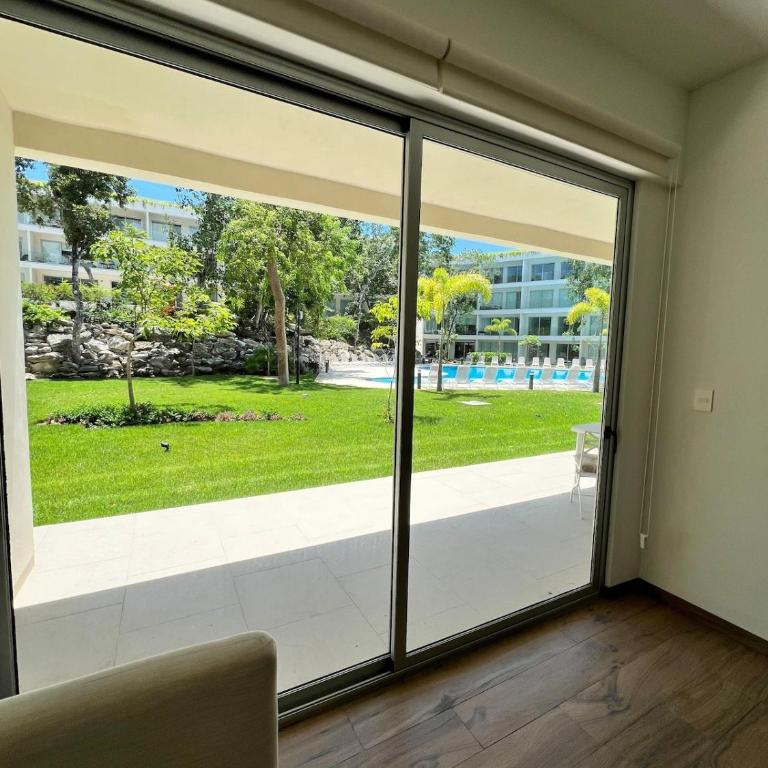 Luxurious Condo with Poolside Patio - Two-Bedroom Apartment with Pool View - 17