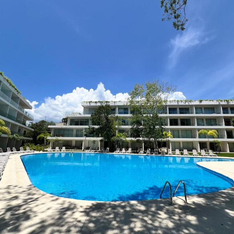 Luxurious Condo with Poolside Patio - Two-Bedroom Apartment with Pool View - 18