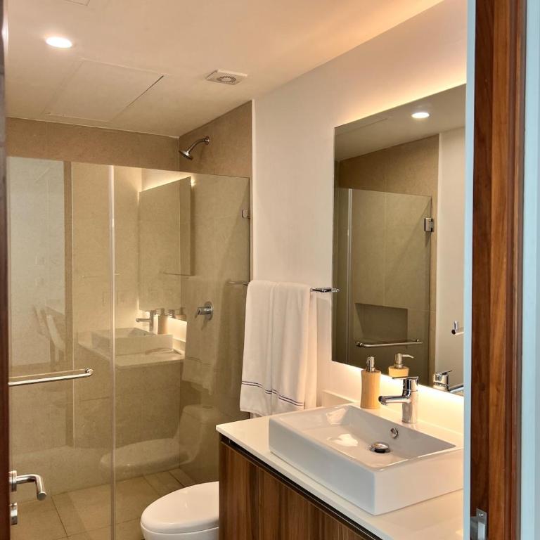 Luxurious Condo with Poolside Patio - Two-Bedroom Apartment with Pool View - 23