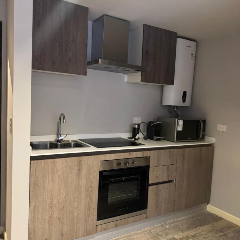 Nogales Apartamentos - Apartamento de 1 dormitorio con jardín - 2