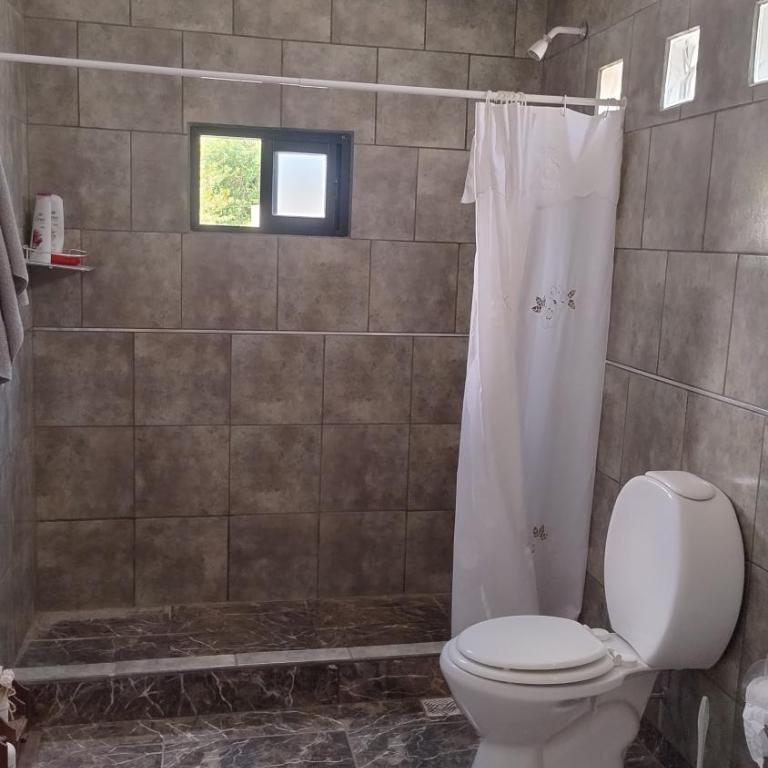 Casa de verano en Verónica - Two-Bedroom House - 16
