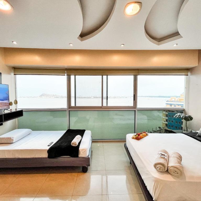 Luxury 2BR River View Apartment Pool, Gym & Jacuzzi - Two-Bedroom Apartment with River View - 39