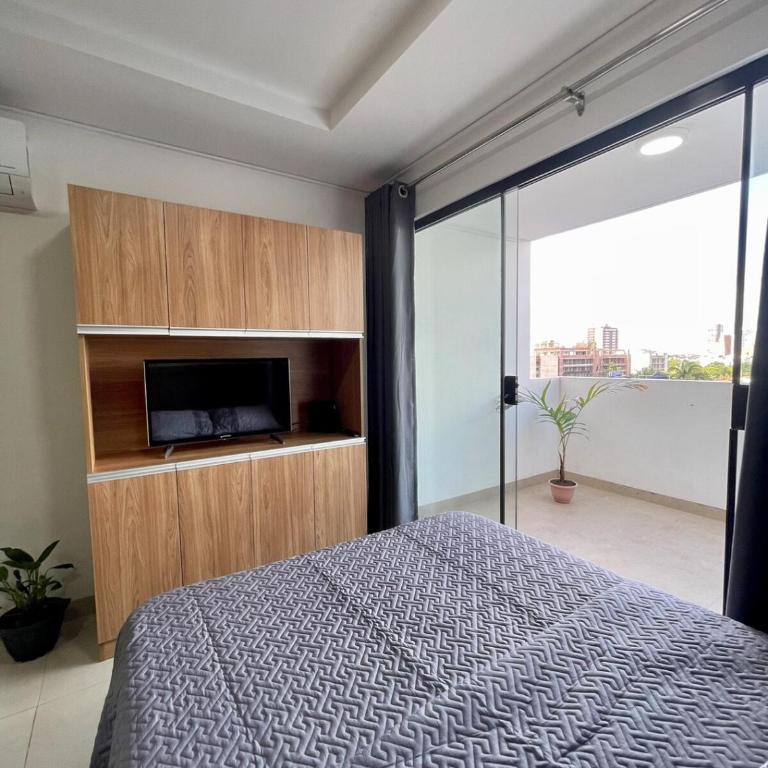 Amplio Studio con terraza privada en Equipetrol - Apartamento de 2 dormitorios - 21