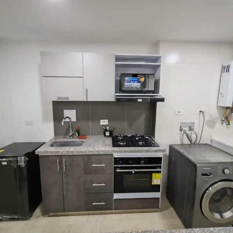 Apartamento moderno frente a la Universidad Santo Tomás WiFi y parqueadero - One-Bedroom Apartment - 7