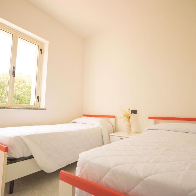 Oasi di Luce - Appartamento con 2 Camere da Letto e Vista Giardino - 11