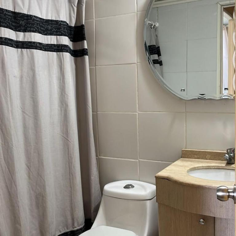 Acogedor departamento cerca del movistar arena - Three-Bedroom Apartment - 10
