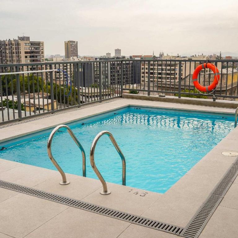 Modern Apartment with Terrace | Steps from Movistar Arena & Barrio Universitario | Up to 4 Guests - One-Bedroom Apartment with Balcony - 2