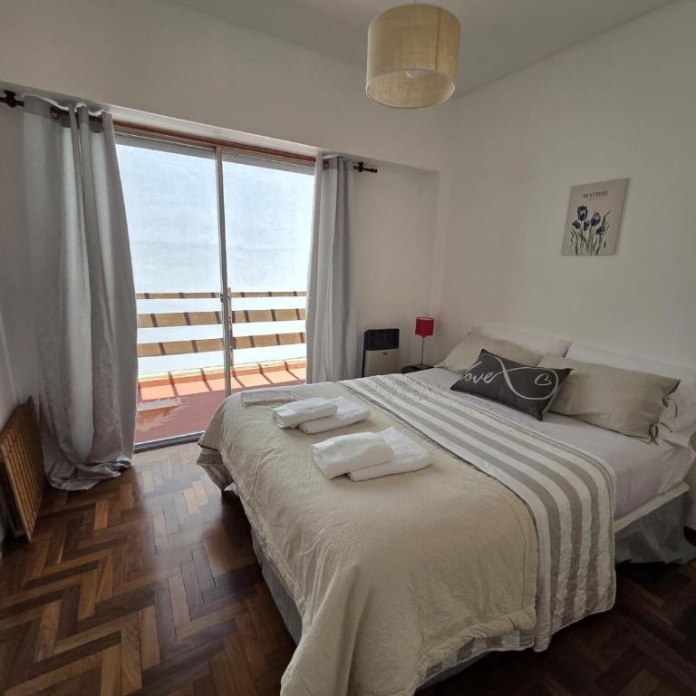 Departamento tres ambientes con cochera en Playa Grande - Apartamento de 2 dormitorios - 1