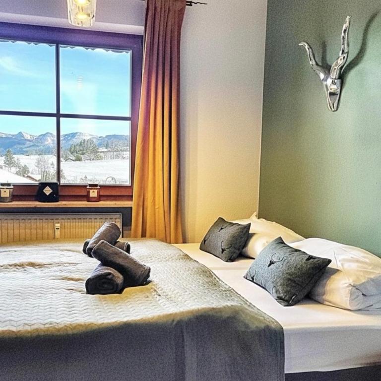 Bergnest Lodge mit Bergblick - Ca 3 min Skilift - Balkon - Garten - 6 Pers - Hund - Luftkurort - nähe Buchenegger Wasserfälle - Eistobel - Bodensee - Apartment mit 1 Schlafzimmer - 43