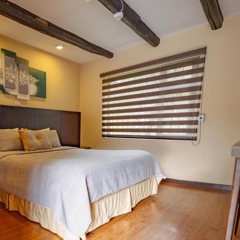 Hosteria Duran - Habitación con cama grande - 5
