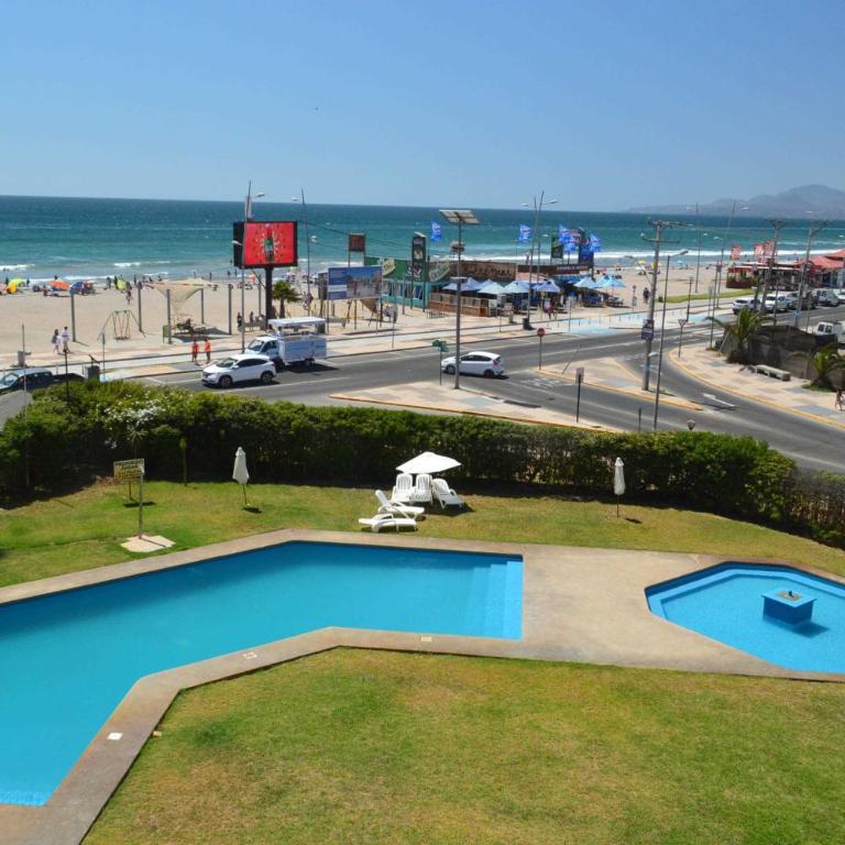 Gran Depto 12 Pers, Frente al Mar, 4 Esquinas, king,Queen,8 singles - Four-Bedroom Deluxe Apartment - 1