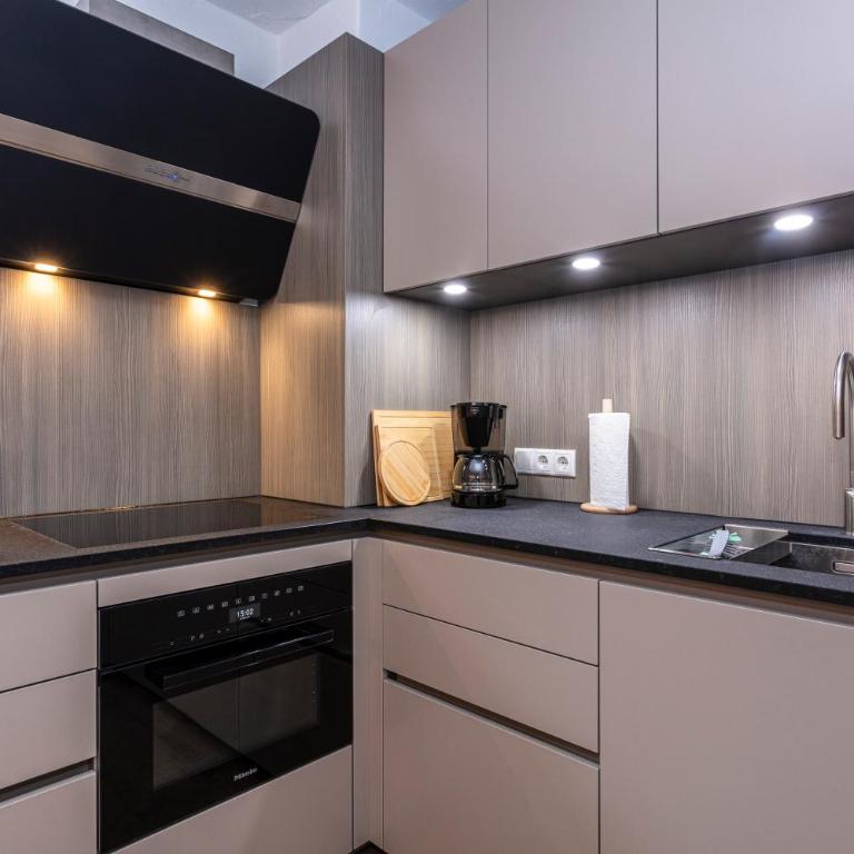Großes Ferienhaus für 10 Personen mit Kachelofen & Bergblick - Appartement - 26