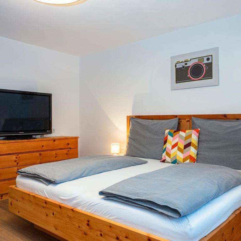 Großes Ferienhaus für 10 Personen mit Kachelofen & Bergblick - Appartement - 61