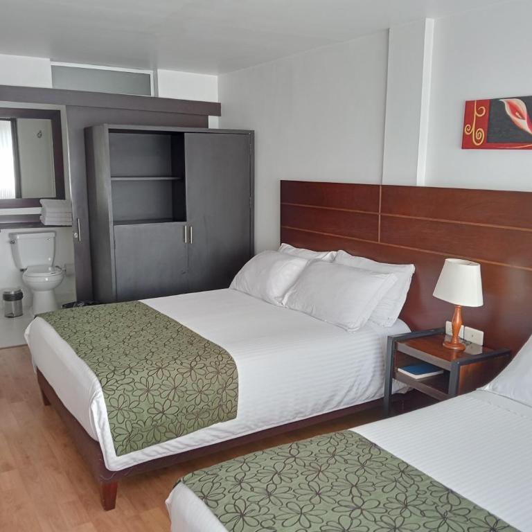 Europa Hotel Boutique Manizales - Habitación Cuádruple Estándar - 9
