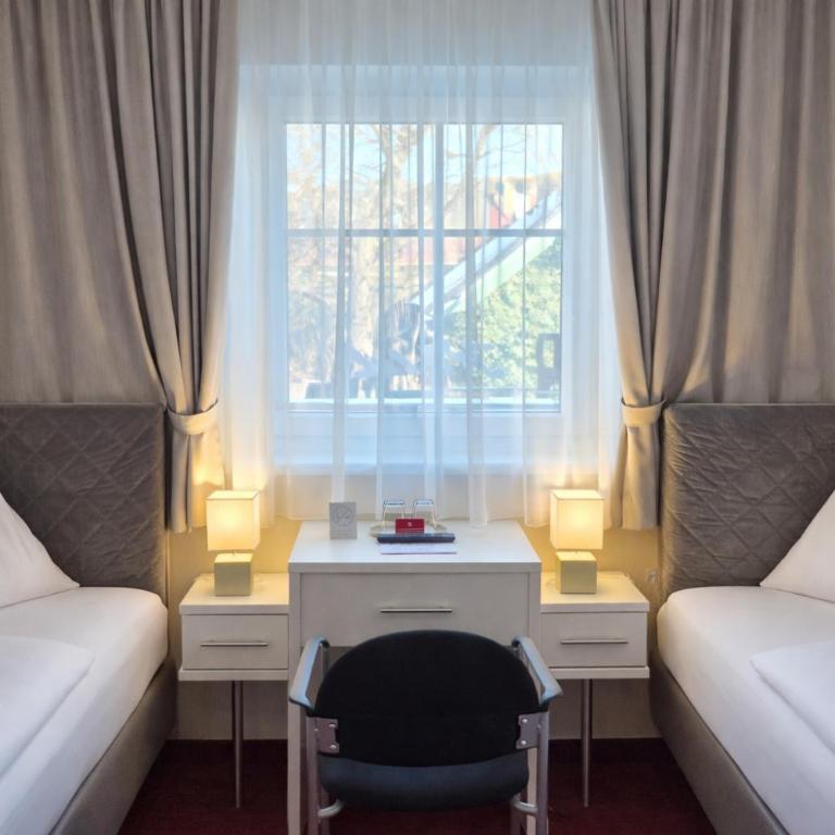 Stadthotel Kramer - Kleines Zweibettzimmer - 1