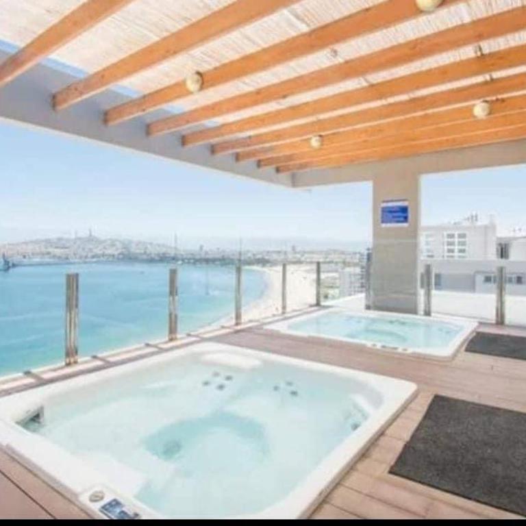 Exclusivo Departamento de lujo con vista al mar & salida directo a playa la herradura - One-Bedroom Apartment - 1