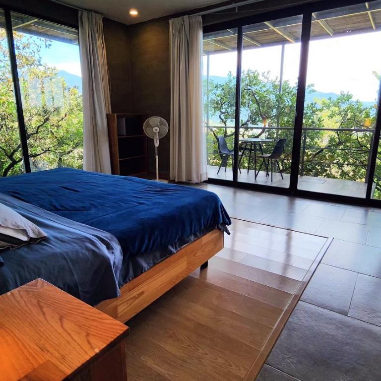 Utopia Casas Boutique - Suite con cama grande y balcón - 9