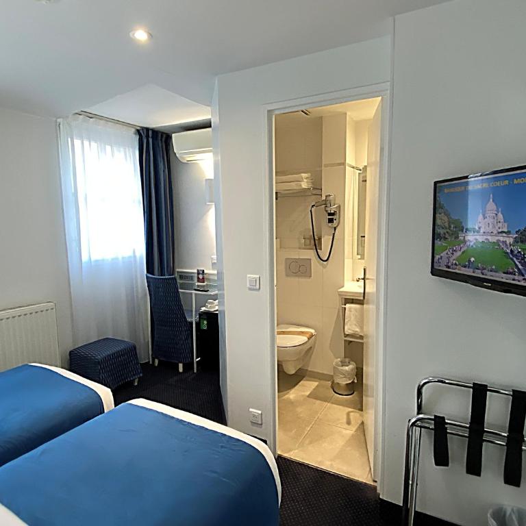 Austin's Saint Lazare Hotel - Chambre Lits Jumeaux - 6