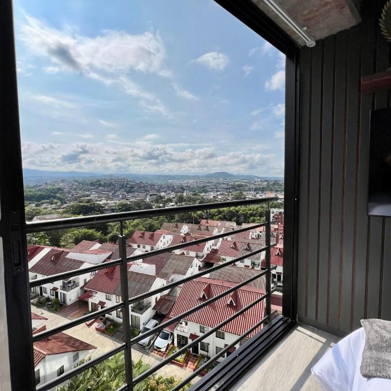 Suite tipo loft de lujo cerca al aeropuerto con AC - One-Bedroom Apartment - 6