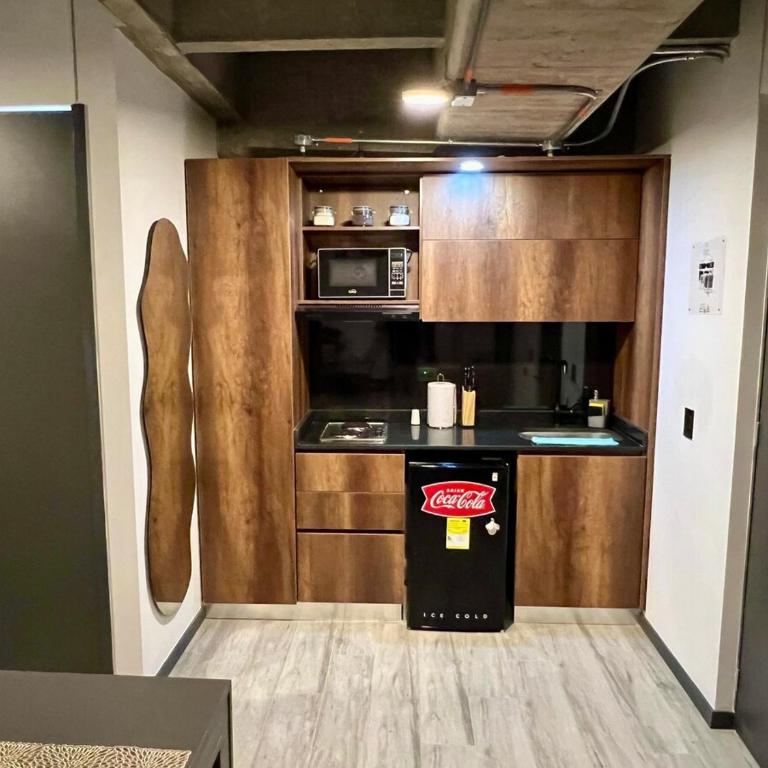 Suite tipo loft de lujo cerca al aeropuerto con AC - One-Bedroom Apartment - 8