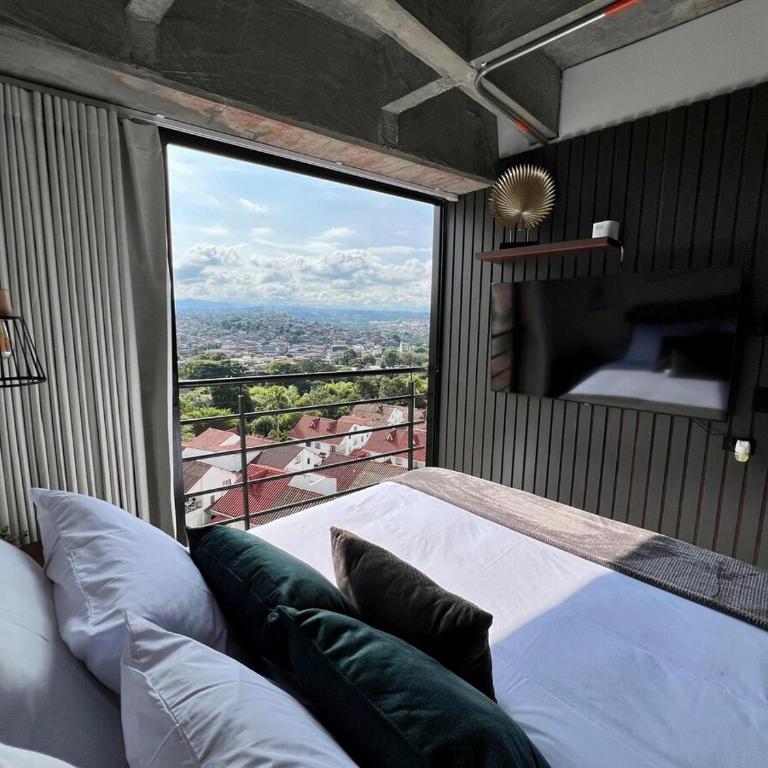 Suite tipo loft de lujo cerca al aeropuerto con AC - One-Bedroom Apartment - 2
