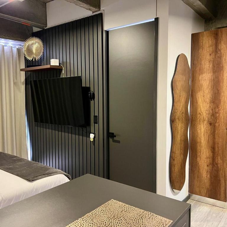 Suite tipo loft de lujo cerca al aeropuerto con AC - One-Bedroom Apartment - 12