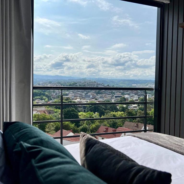 Suite tipo loft de lujo cerca al aeropuerto con AC - One-Bedroom Apartment - 20