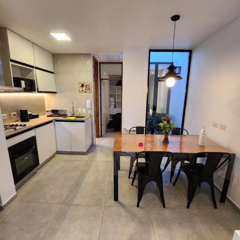 PH estilo industrial con parrilla y cochera descubierta - Apartamento de 2 dormitorios - 4