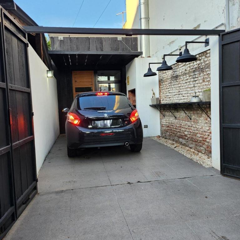 PH estilo industrial con parrilla y cochera descubierta - Apartamento de 2 dormitorios - 5
