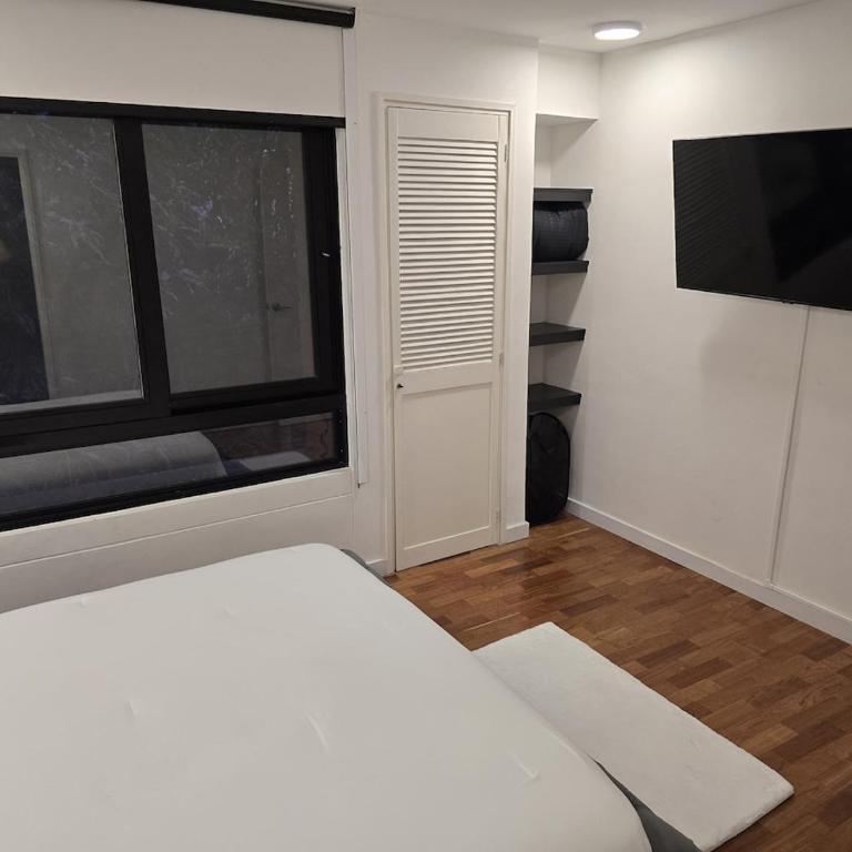 Modern Apt in Poblado with Private Terrace & Gym - Three-Bedroom Apartment - 13