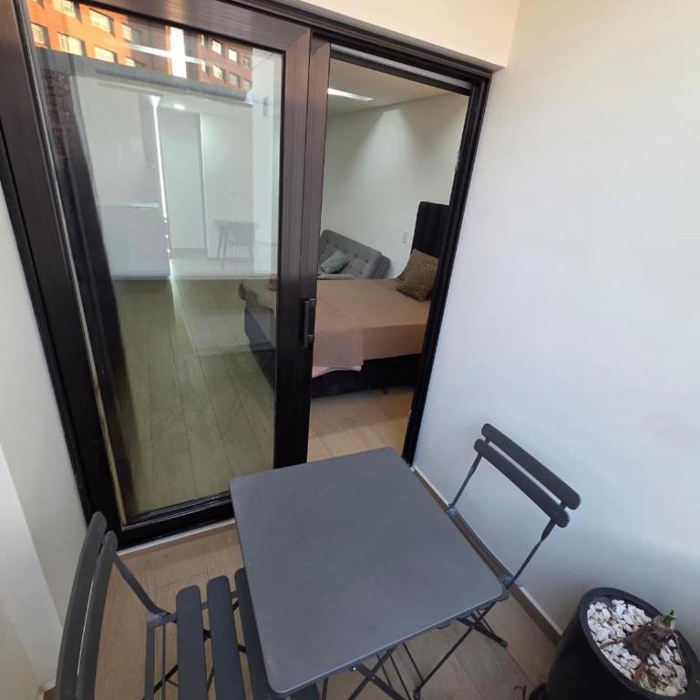 Piscina y gym Suite Top Premium en Equipetrol - One-Bedroom Apartment - 11